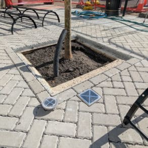 The new paving outside county hall with drains into the SUDS system