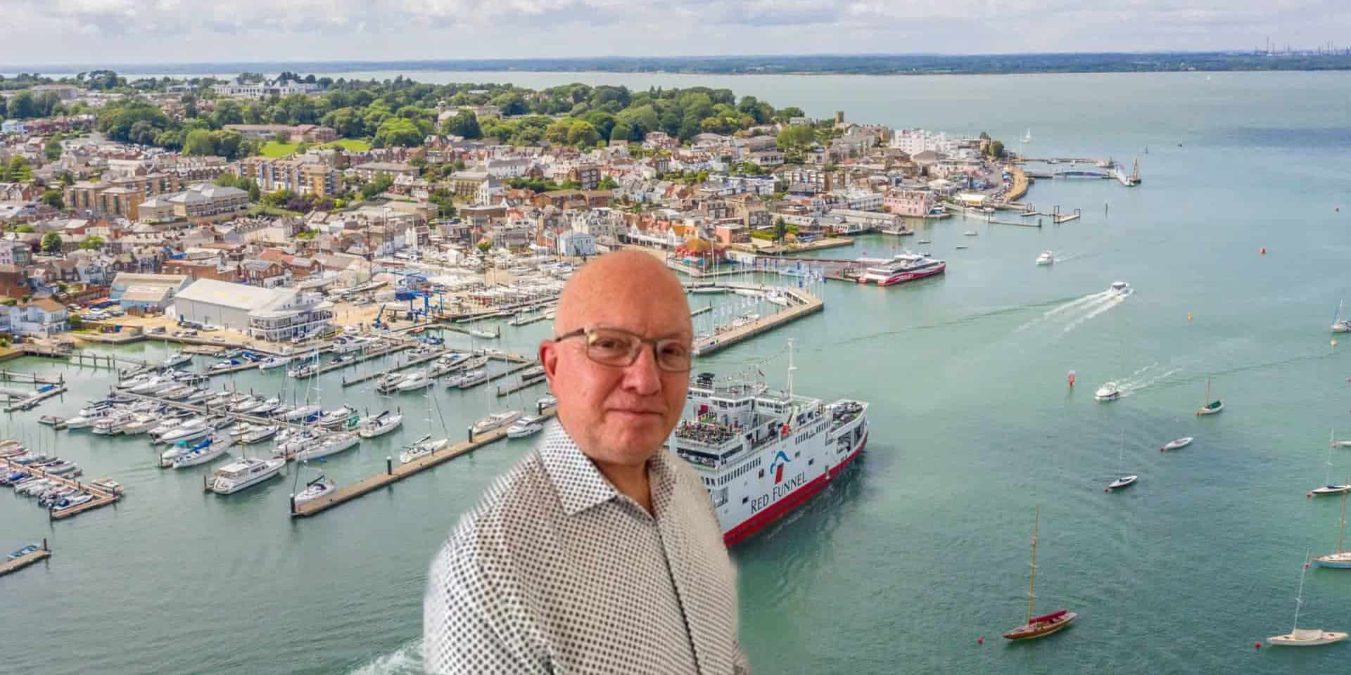 Neil Chapman portrait on background image of Red Funnel ferry leaving Cowes