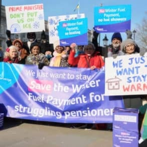 Group of campaigners with banners and placards