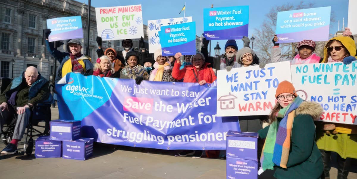 Group of campaigners with banners and placards