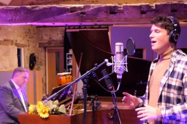 Nigel hartley on the piano with Mike Christie singing