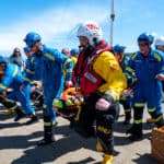 Cowes RNLI volunteer crew and Coastguard teams running the Mayday Mile