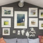 Framed Paintings hanging in Birgit's studio