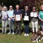 Graham Hawkins of Woodrord's Butchers; Stella Peterson-local supporter; Lindsey Newberry and Ally de Trey-community leads for Plastic Free Bembridge (PFB); Martin Groom-chair of Bembridge Parish Council; Alison Austin of The Sea Room; Gail Cooper of Bembridge Barbers; Stephanie Elliott lead for Greenpeace IOW which is a community ally and David Hunt of David Hunt Tai Chi