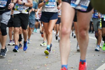 The legs and feet of marathon runners