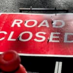 road closed sign on the floor