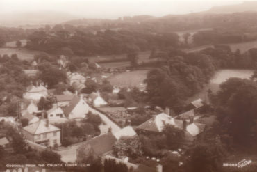 Heritage postcard showing aerial shot of Godshill