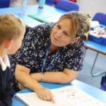 Teacher and pupil in a classroom