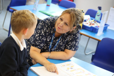 Teacher and pupil in a classroom