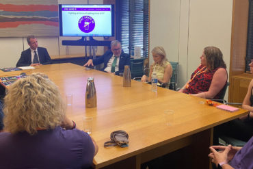 Joe Robertson with other MPs during round table discussion