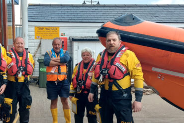 Volunteer Cowes RNLI crew prepare to launch for planned patrol at the Isle of Wight Festival