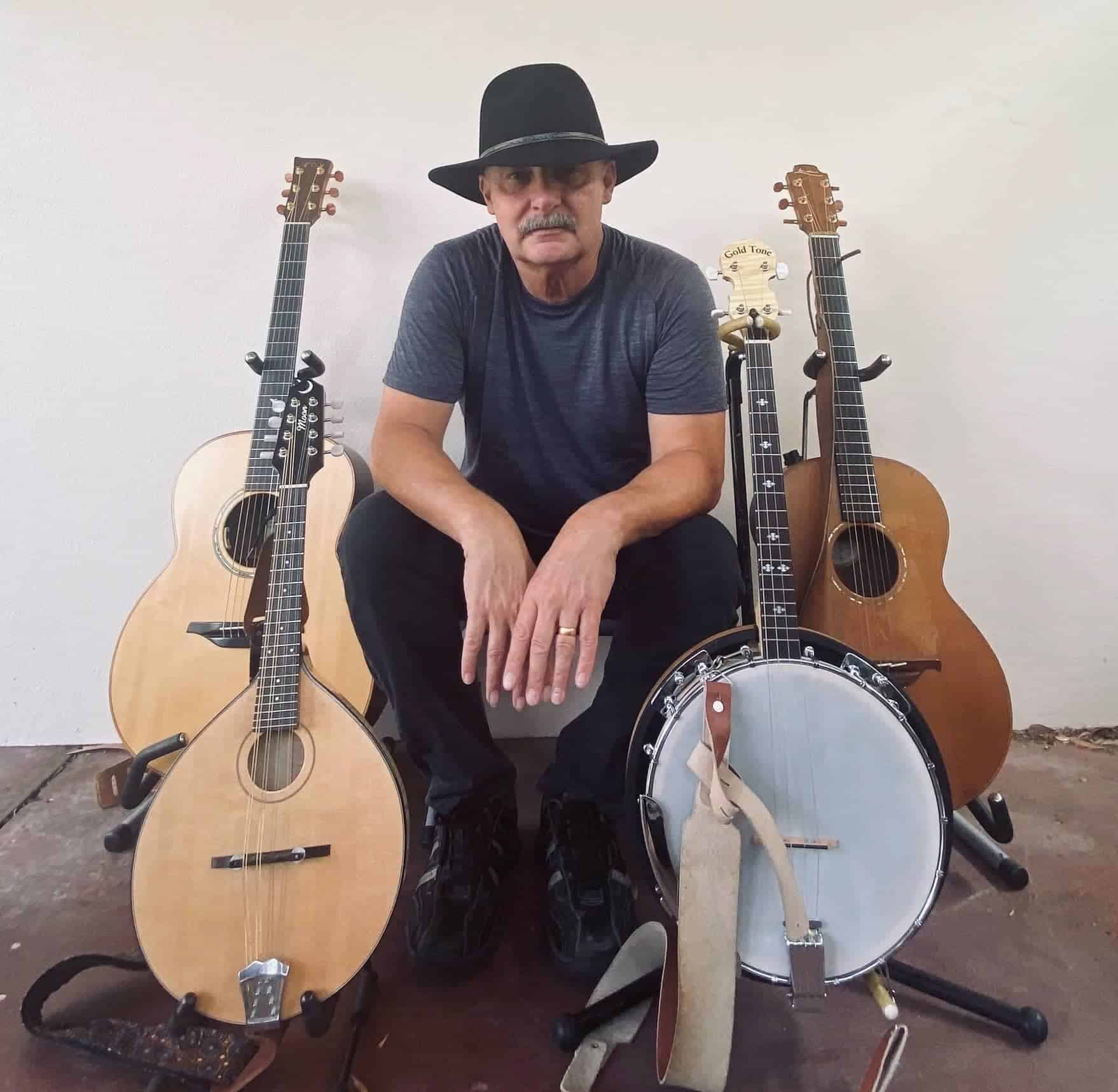 John Ralph with his guitars