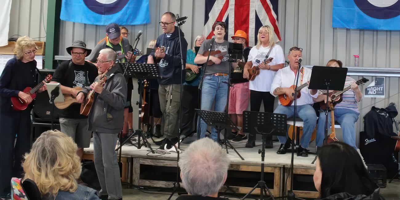 Ukulele band playing on stage