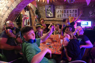 Teenagers playing card games at the Creative Hub Ryde