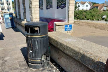 Seafront bin damaged by fire