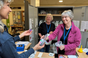 Woman buying refills at West Wight Sports and Community Centre