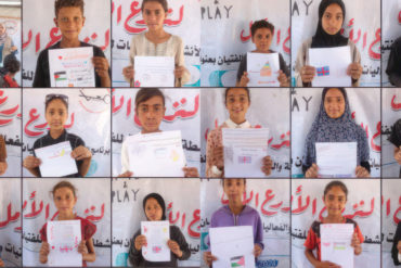 Gazan children holding up their drawings
