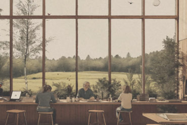 Artist's impression of people working in the International School of Rewilding, with large windows looking out onto the rewilded area