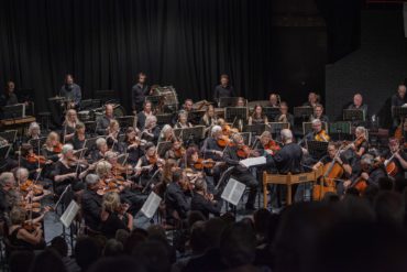 The orchestra playing at Medina Theatre