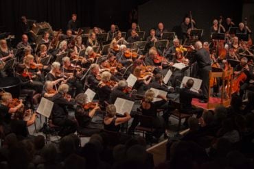 The orchestra playing at Medina Theatre