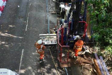 Aerial view of engineers working on the Leeson Road rig
