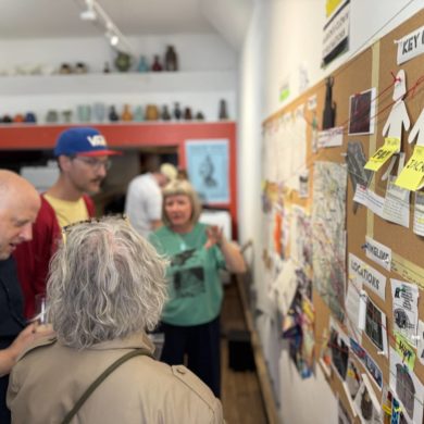 Amateur sleuths looking at the evidence board trying to make sense of the evidence