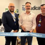 Richard Quigley with two other men opening SpaMedica eye centre
