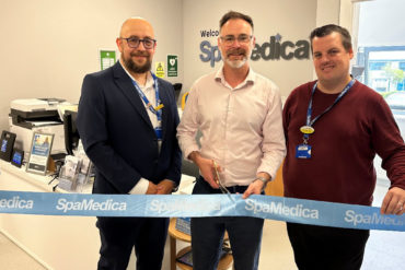 Richard Quigley with two other men opening SpaMedica eye centre