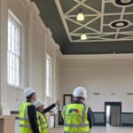 Joe Robertson being shown around Sandown Town Hall