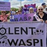solent and Isle of Wight group at Tolpuddle Festival with WASPI banners