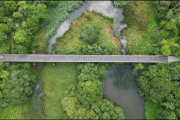 aerial photo of cement mills viaduct, crossing the river