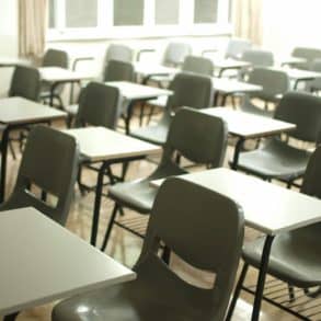 school desks and chairs in a classroom