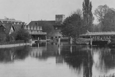 An historic black and white photograph showing the boathouse