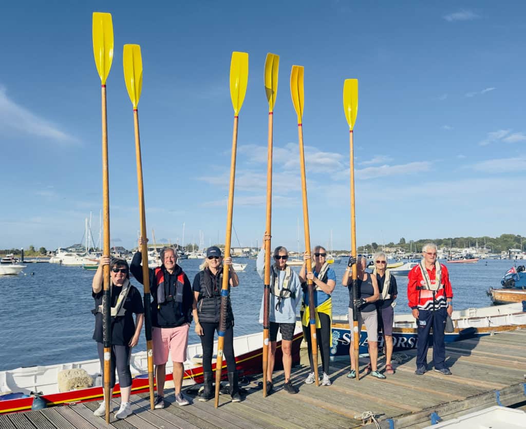Brading Haven Gig Rowers holding their enormous oars