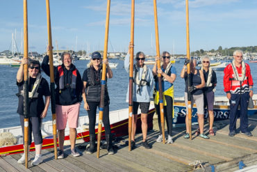 Brading Haven Gig Rowers holding their enormous oars