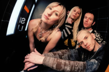 COACH PARTY band members posing for photo