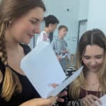 Pupils receiving their GCSE results at the College