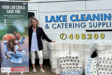 Becci Youle, co-owner of Lake Cleaning and Catering Supplies, and Fiona Seymour with the donated toilet rolls