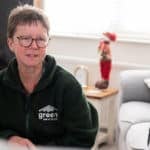 Lisa Beaney in the home of an older person talking to them about energy saving ideas