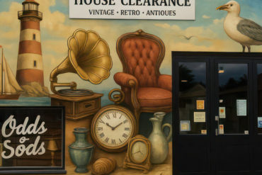 Odds and sods mural showing antiques in a seaside setting
