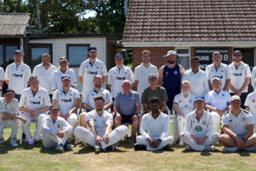 The cricket team posing for a group photo at Presidents Day 2024