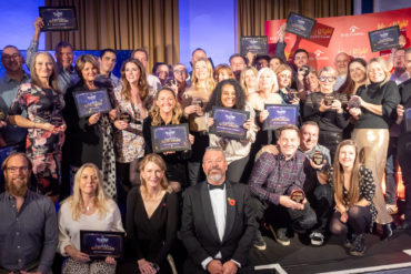 Red Funnel awards winners with their trophies and certificates