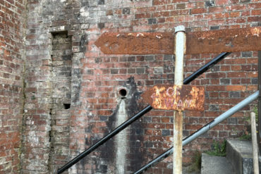 bembridge fort decayed bricks and rusty signs