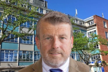 Mugshot of David Maclean overlaid on photo of county hall