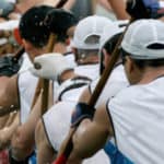 Photo of men taking part in dragon boat racing