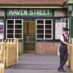 Havenstreet Railway Station with young volunteer -