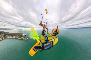 Aerial shot of Jake Scrace Kitesurfing over the Needles