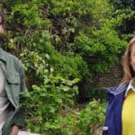 Joe Lever and Claire Critchison standing in a green garden