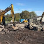 Diggers on the site of Sandham Gardens pulling up the earth to create the new playzone