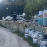 area where beach huts will go - currently storing large metal cannisters